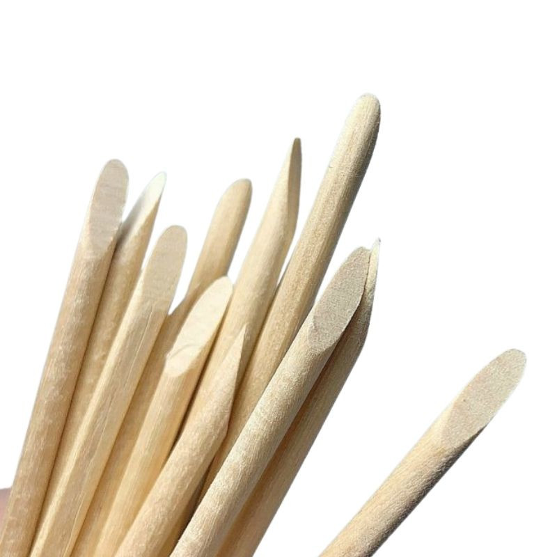 Lesena palčka za potiskanje kožice